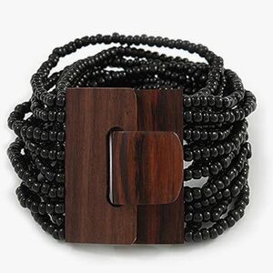 aBlack Glass Bead Multistrand Flex Bracelet With Wooden Closure